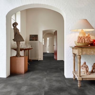 stone look luxury vinyl tile floors in a stylish hallway